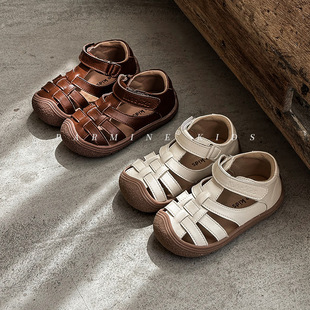 Leather children's simple hollow toddler shoes summer new men's and women's baby baotou anti-kick sandals a generation of hair
