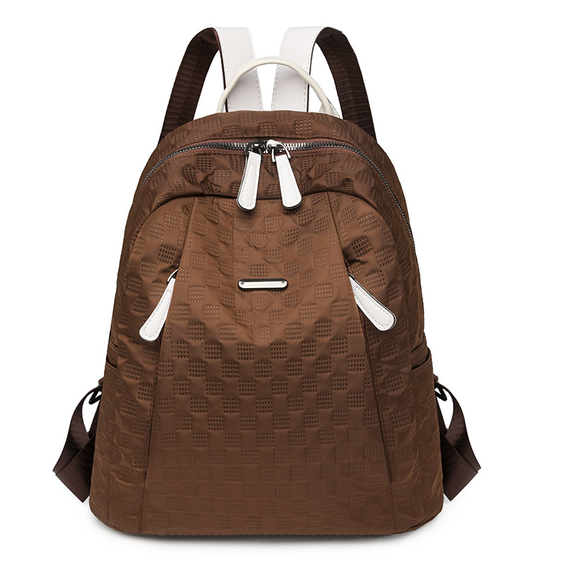 2024 otoño nuevo estilo casual todo fósforo damas mochila de nailon moda color de contraste ligero mochila de viaje de viaje