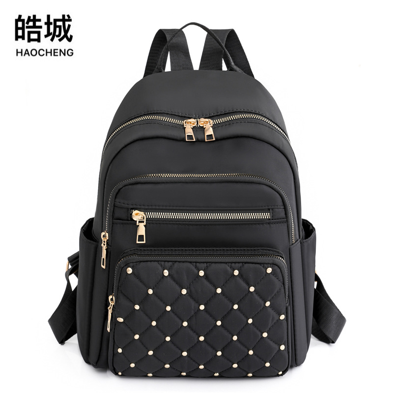 Transfronterizo nuevo estilo 2022 casual versión coreana de las señoras mochila de nailon moda literatura al aire libre mochila de viaje marea al por mayor