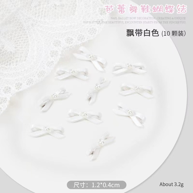 Pequeño libro rojo explosión zapatos de ballet arco flotante joyería de manicura corbata tridimensional 10 paquetes de aleación