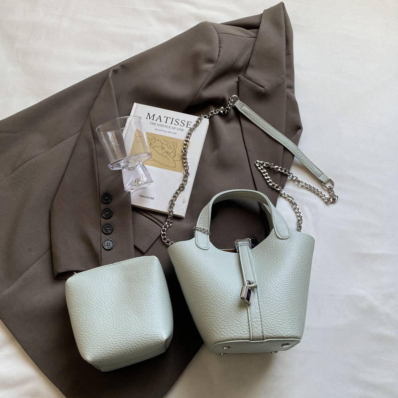 Bolso de madre de cubo de ocio simple para mujer 2025 versión coreana del nuevo bolso de mensajero exquisito de textura de moda ins