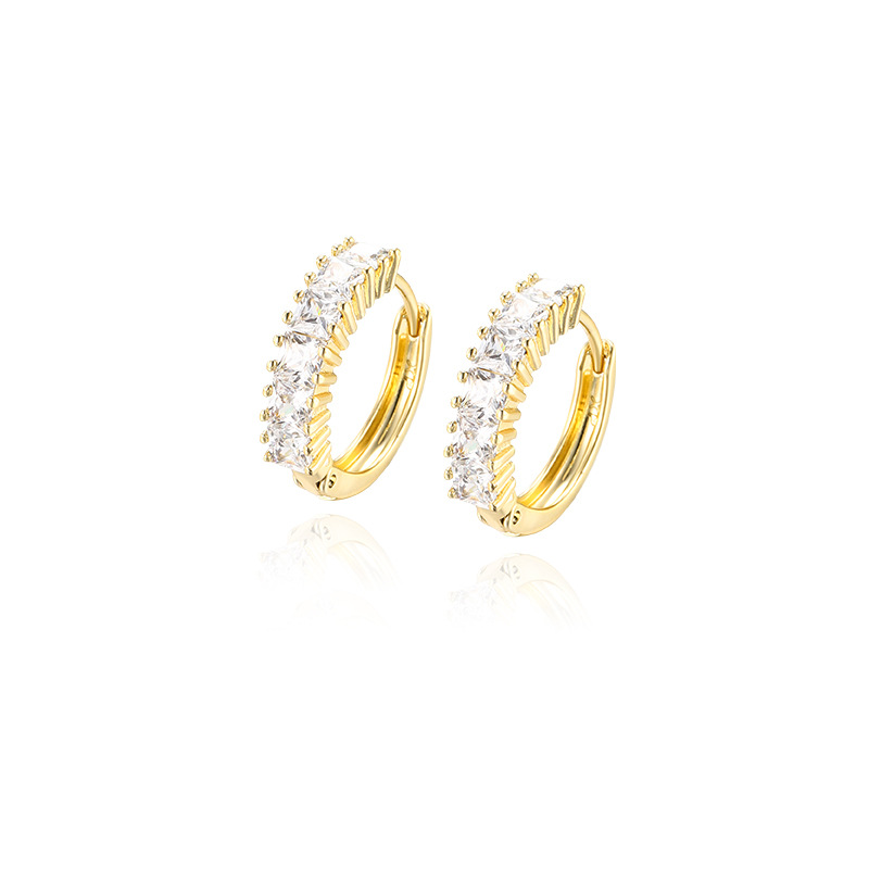 Xuping incrustado de una sola fila de zircon simple europa y americana transfronterizos de aleación de cobre nicho personalidad pendientes de orejas de viento al por mayor
