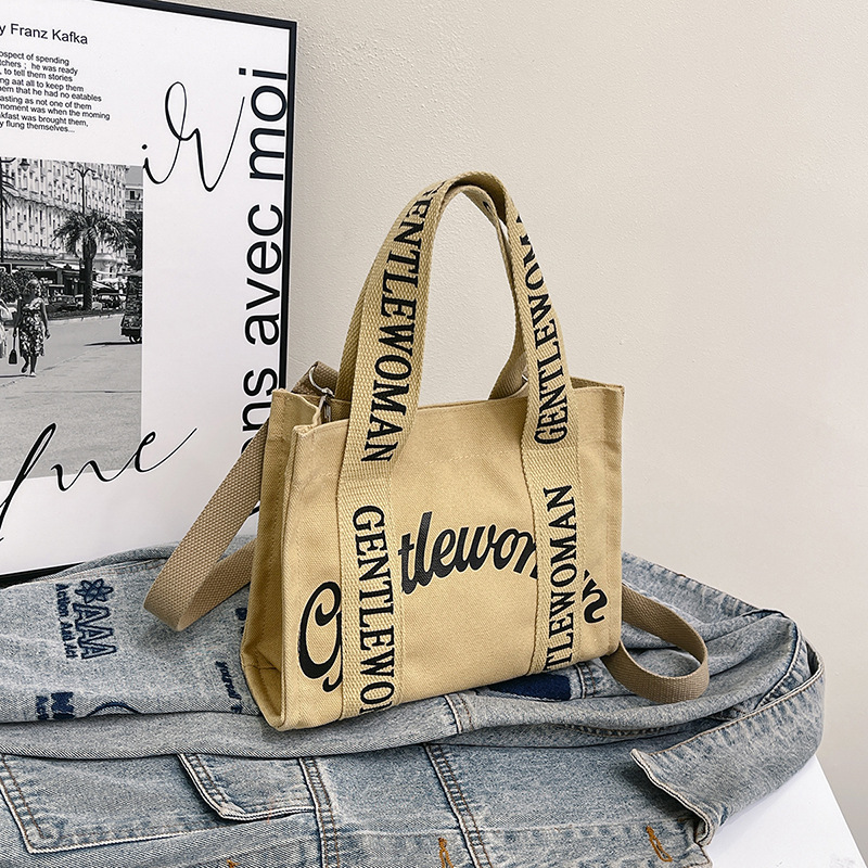 GentleWoman hombro letras bolso de lona portátil 2025 nuevo tailandés nicho transfronterizo bolso de hombro