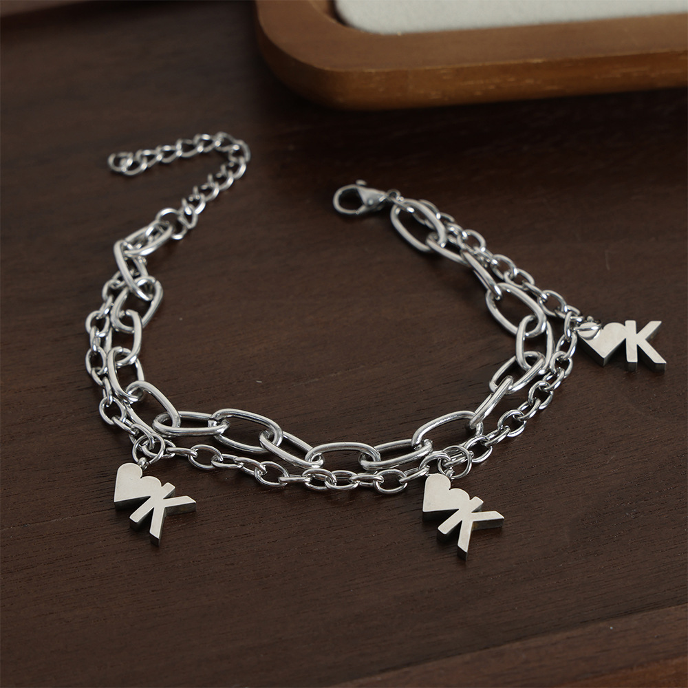 Chino antiguo estilo nicho personalidad Cadena de doble capa cadena apilada estilo diseño amor OK colgante titanio pulsera de acero al por mayor hembra