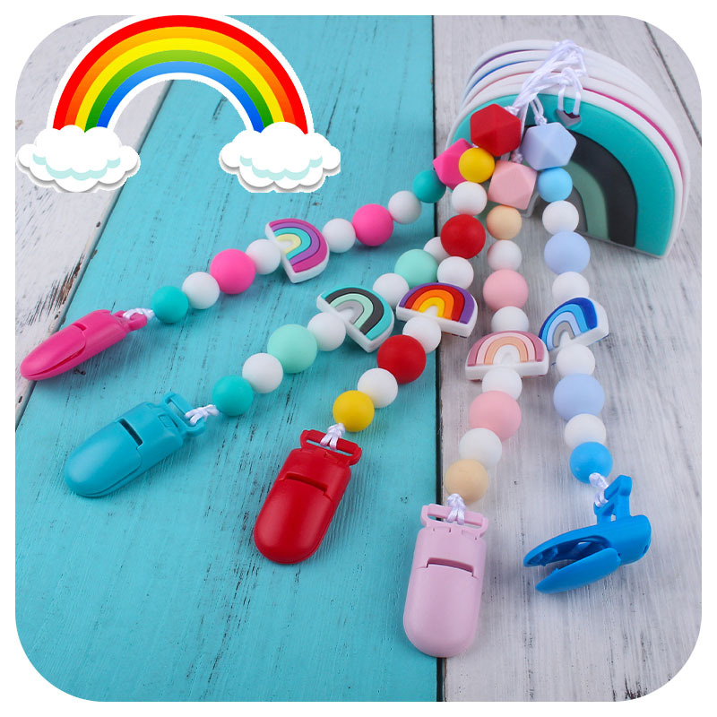 Nuevo bebé dibujos animados colorido rojo silicona teether palo pezón cadena anti-gota cadena juguete teether traje