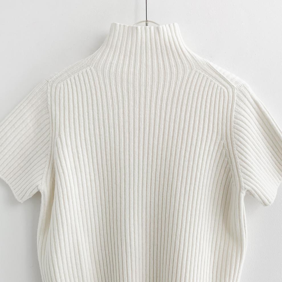 Abbigliamento donna chic primavera retrò temperamento collo alto versatile maglione a maniche corte + gonna con spacco sui fianchi tailleur gonna_voghion.com