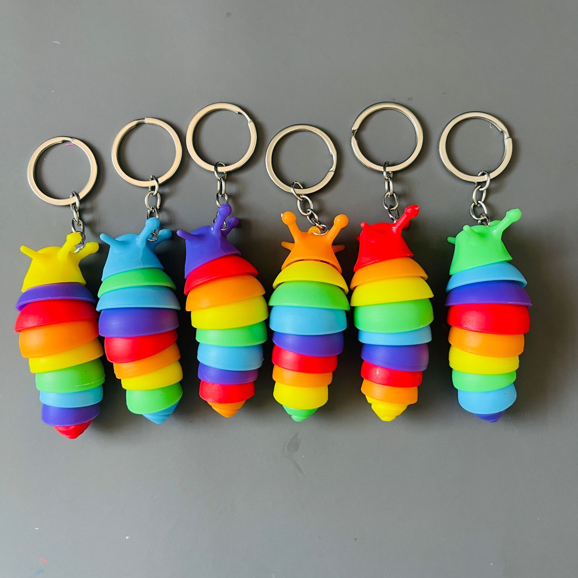Cross-border New Rainbow Caterpillar Keychain Play Decoration Dual-purpose Pendant Novelty Decompression Slug Toy