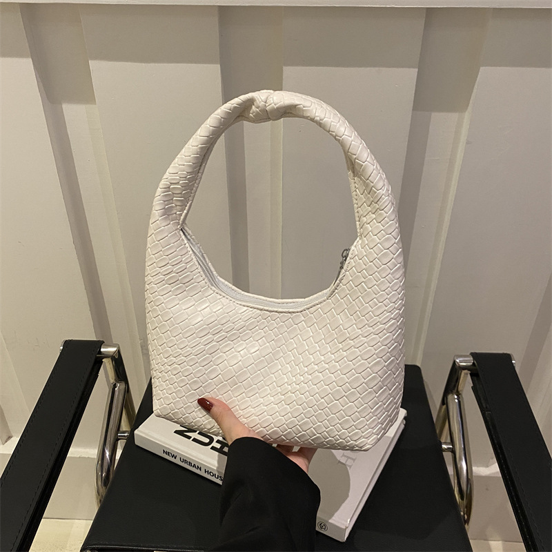 2025 moda popular trenzada simple bolso de viaje de nicho bolso de brazo bolso de hombro de gran capacidad