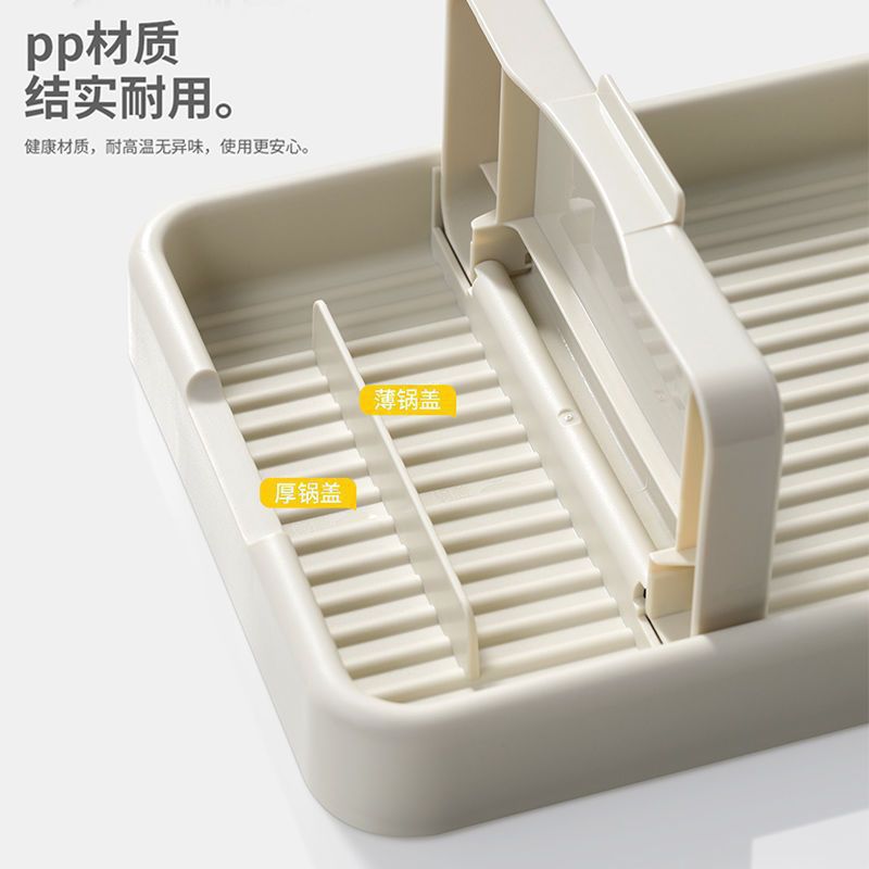 주방 냄비 뚜껑 랙 조리대에 앉아있는 스푼, 주걱, 주걱 랙을 보관할 수 있는 접이식 랙