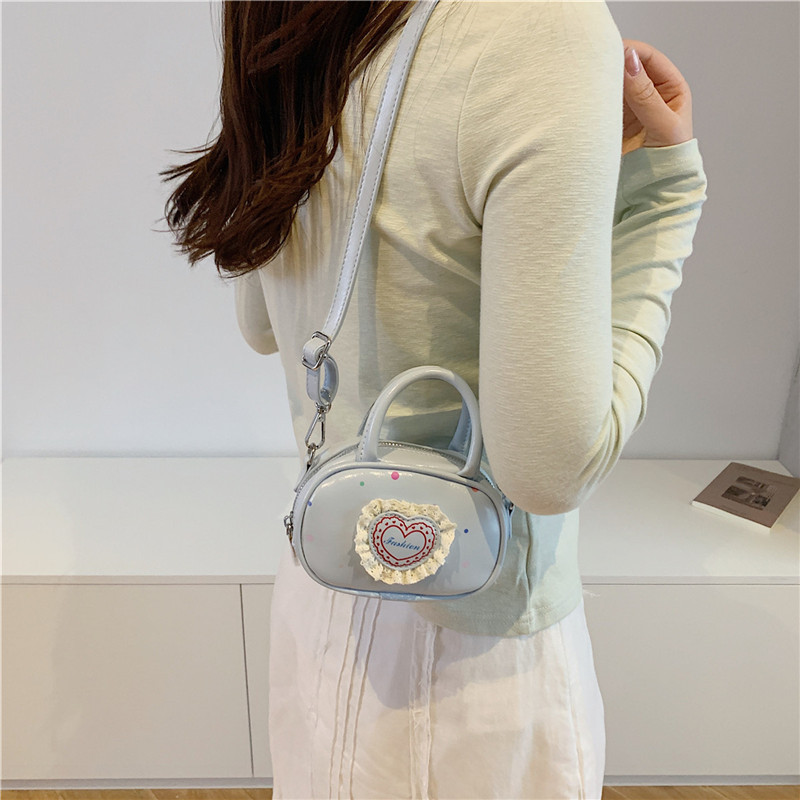 Bolsas de niños de encaje dulce, bolsas de mano de chicas, ondas de color extranjero, mini bolsas de hombro para hombres y mujeres