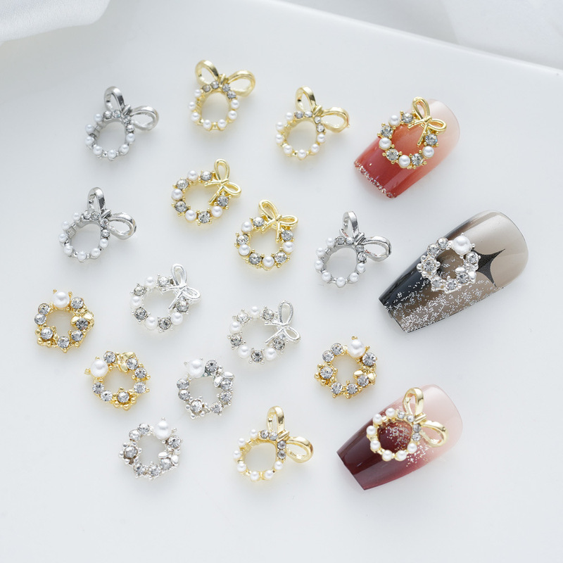 Internet red hot alloy nail jewelry wreath bow tie series diamond pearl hollow luxury three-dimensional nails wholesale