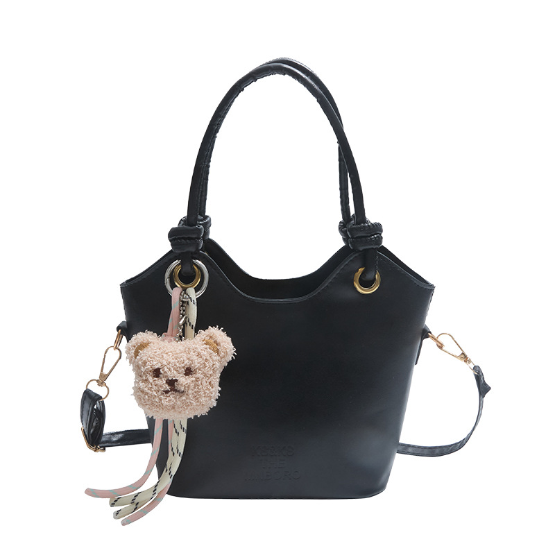 2025 nuevo bolso pequeño de estilo occidental simple y popular bolso de mensajero de moda de verano femenino bolso de cubo portátil casual