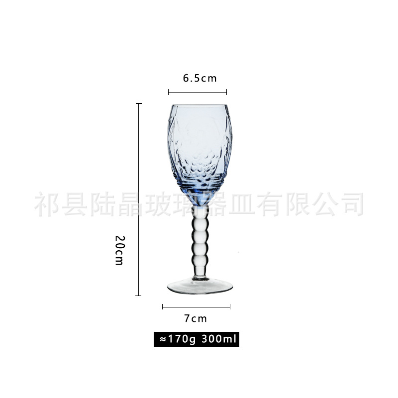 Copa de vino azul del mar