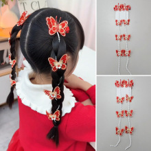 2025蛇年新春女童气质发饰过年拜年喜庆大红仙气蝴蝶珍珠链编发夹