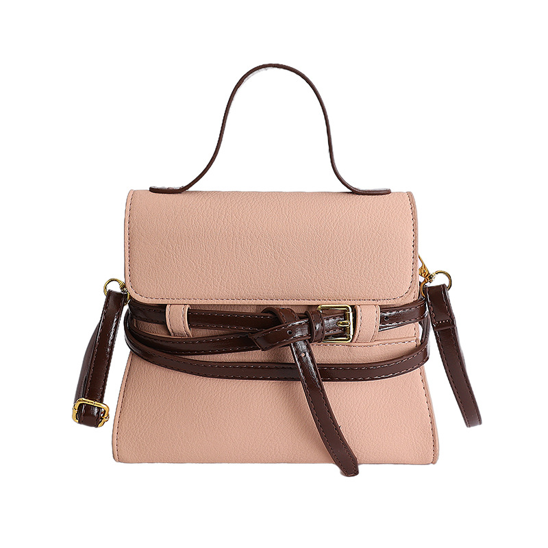 Bolsas de mano de nicho coreano de color contraste para mujeres 2026 primavera textura simple moda diaria correa de hombro mochila