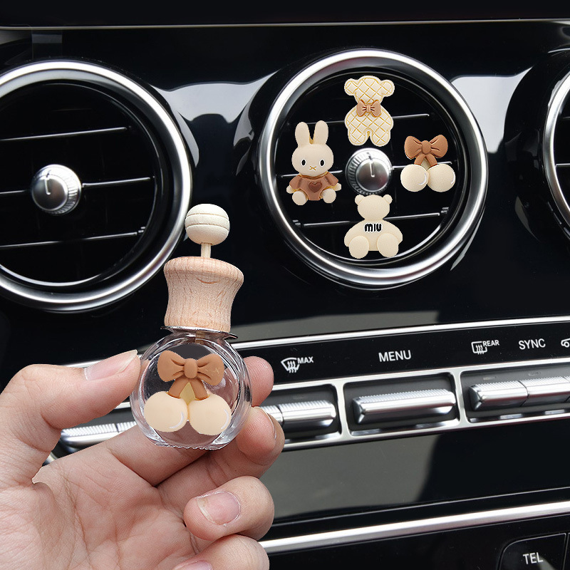 Aromaterapia de coche 2024 nuevo aire acondicionado de coche salida de aire botella de decoración perfume fragancia ligera de larga duración pequeña decoración de coche