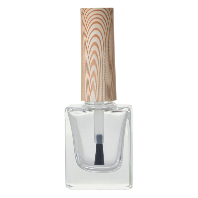 Descuento de fábrica al por mayor en stock 10ML esmalte de uñas de vidrio transparente nuevo multi-forma esmalte de uñas cubierta cepillo grano de madera