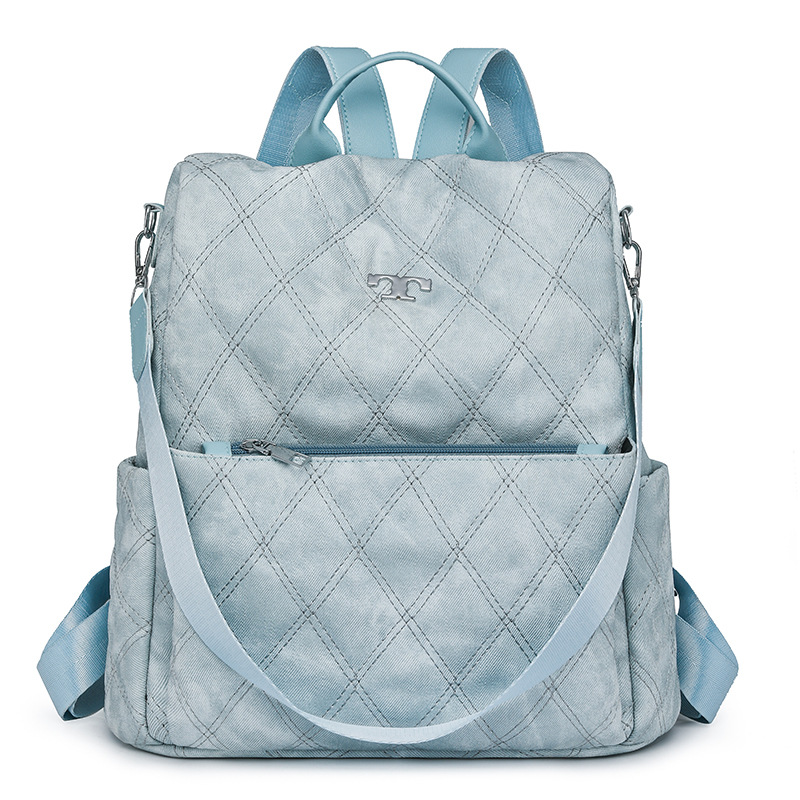 Nueva mochila de cuero suave antirrobo para mujer de gran capacidad y moda Lingge al aire libre mochila de doble uso para viajes ligeros al por mayor