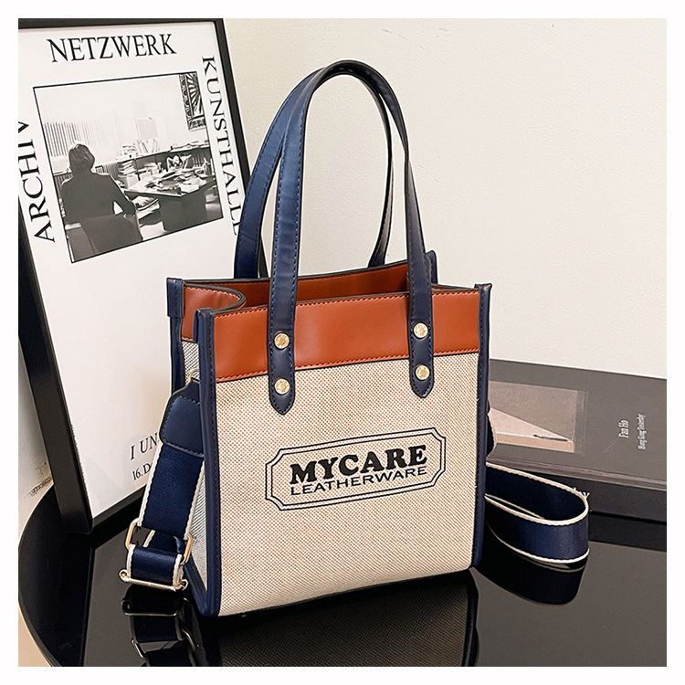 Nuevo cross-border bolso de empalme de color para mujeres 2025 verano lienzo de moda mochila de hombro simple bolsa de viaje image 9