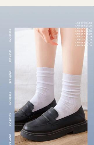 Summer thin ice socks in candy-colored black and white, long-length JK-style socks—trendy Japanese-style mid-calf velvet pile-up socks for students.