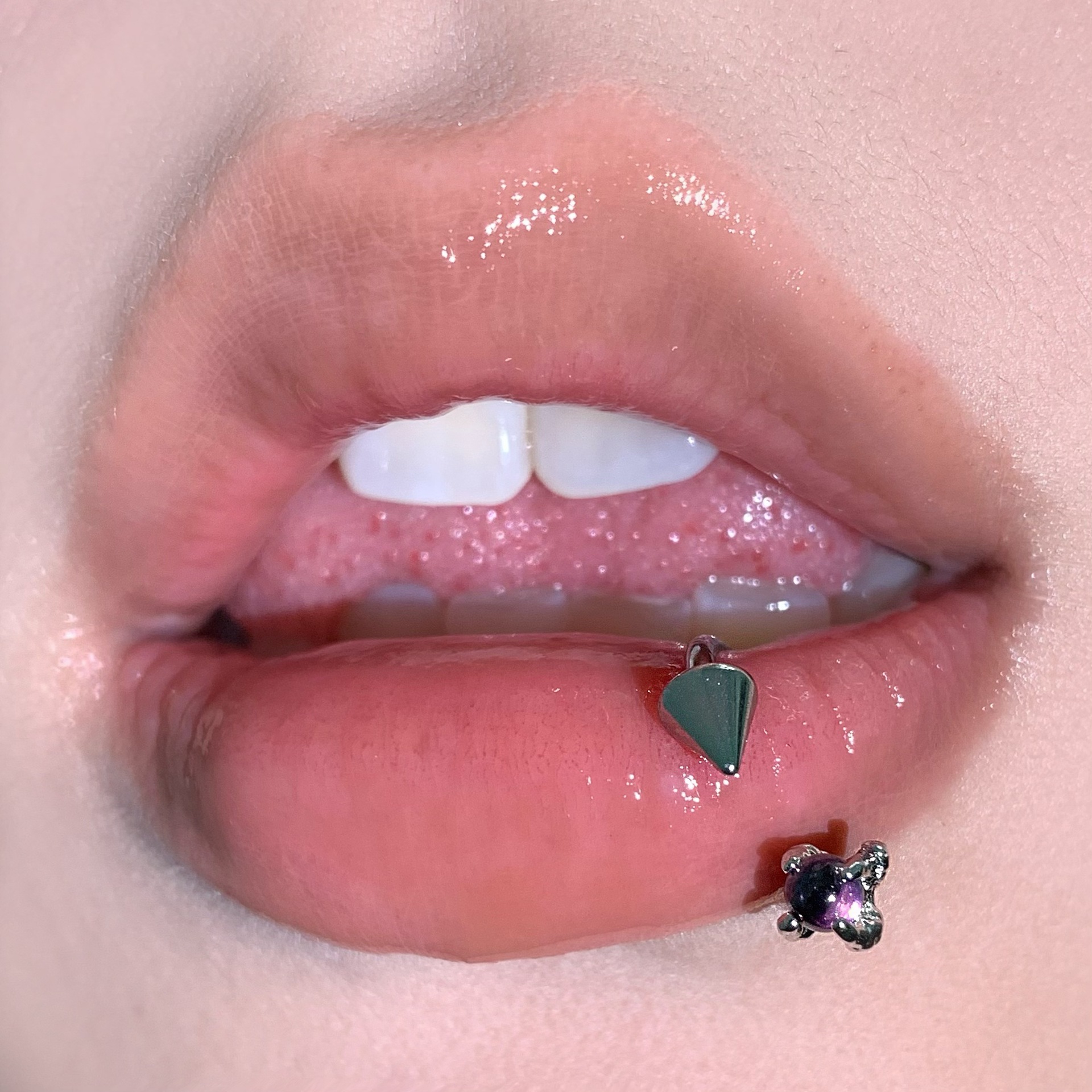 Silver pointed spike labret stud material detail