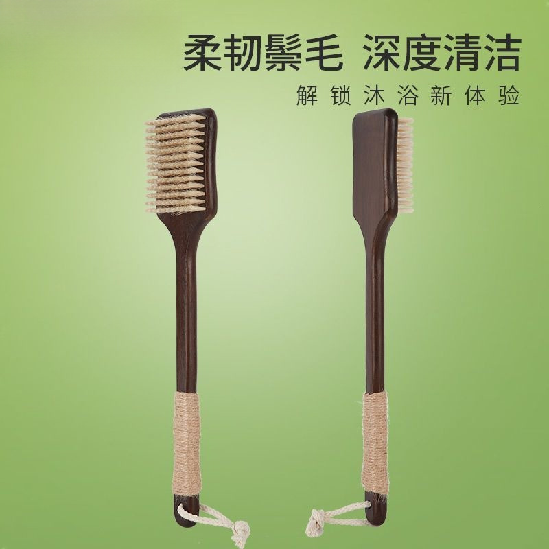 Long-handled bath brush with soft boar bristles, a versatile tool for exfoliating and cleaning the body, including the back