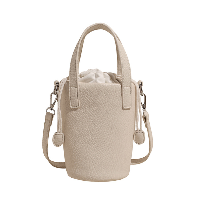 Bolso de cubo de moda coreana 2025 verano nuevo bolso femenino bolso de hombro con patrón de lichi fresco bolso de mensajero simple y versátil