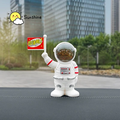 Car ornaments astronaut solar swing car creative hot language astronaut car center console decoration supplies (Car ornaments) - chinese-national-flag-edition-space-man-white