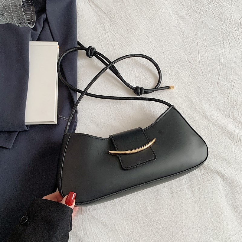 Bolso de axila de un solo hombro de estilo popular de nicho de alta gama para mujer 2025 primavera y verano nuevo bolso bandolera salvaje de moda