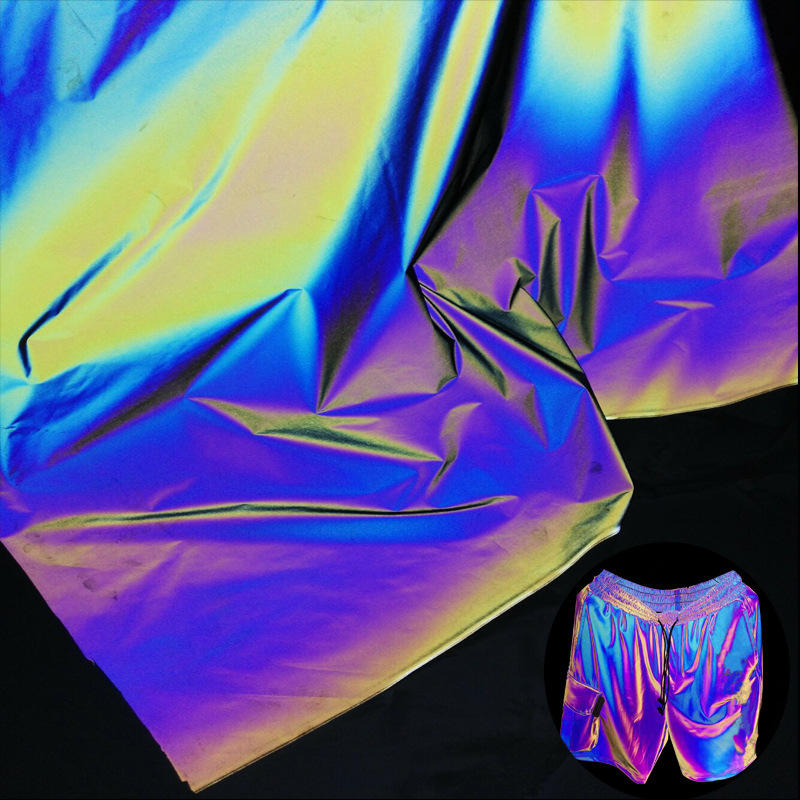 厂家直供蓝色反光涤纶布嘻哈反光慢跑裤面料耐水洗满彩蓝光化纤布