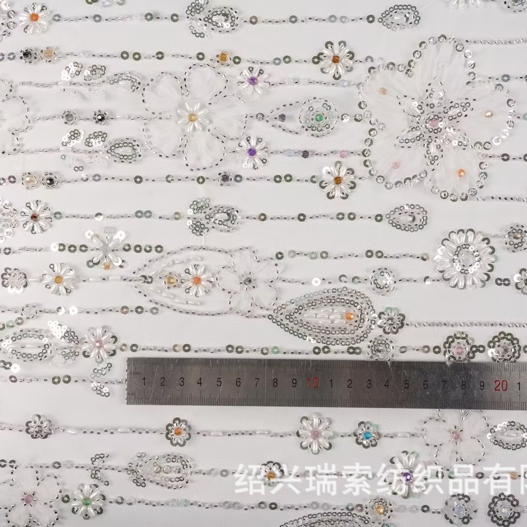 厂家直销现货绣珠薄纱面料婚纱礼服面料服装面料