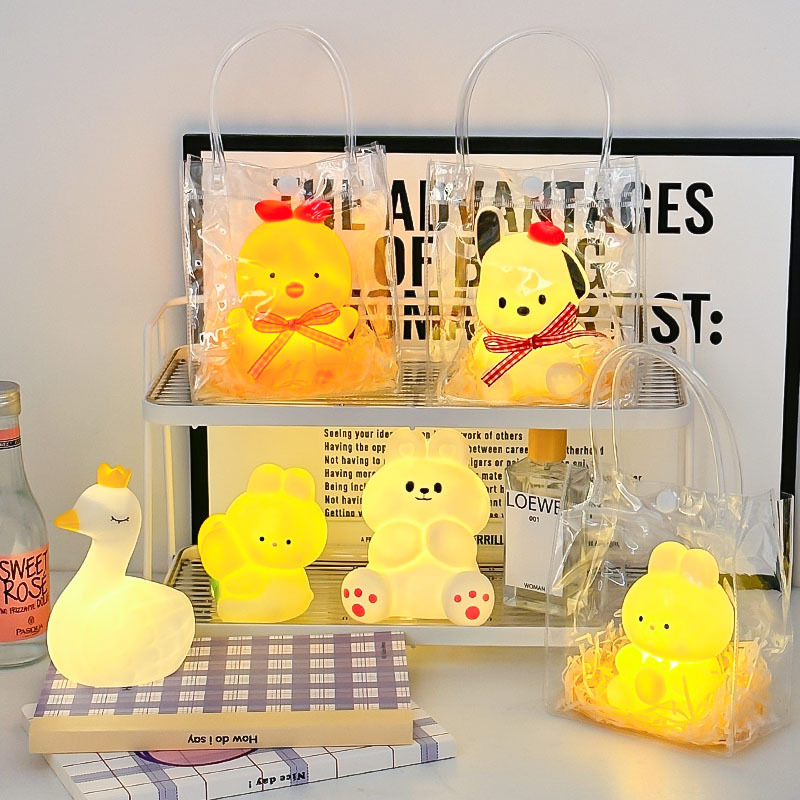 Luz de noche de vinilo de dibujos animados creativo de cabecera faro Internet celebridad juguetes luminosos para niños puesto de mercado nocturno suministro al por mayor