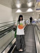 韩系慵懒时尚套装女夏季2025新款橘子印花T恤格子阔腿裤子两件套