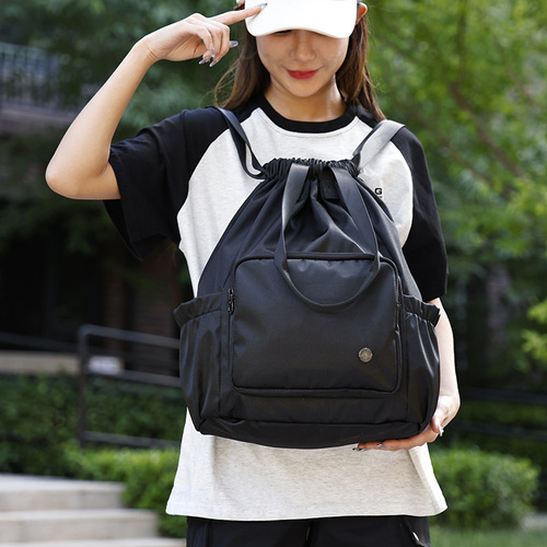 Double-shoulder bag with drawstring pockets, simple and versatile backpack, lightweight for sports, outdoor travel, storage bag, suitable for women, foreign trade.