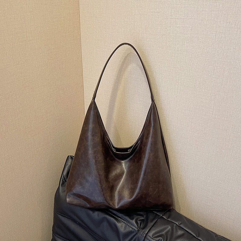 Gran capacidad de moda coreana textura hombro brazalete bolso para mujeres 2025 primavera nuevo estilo minimalista bolso de mujer