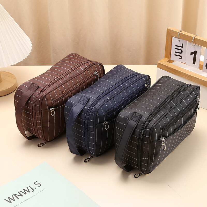 Capacious handheld organizer bag for traveling wet and dry…