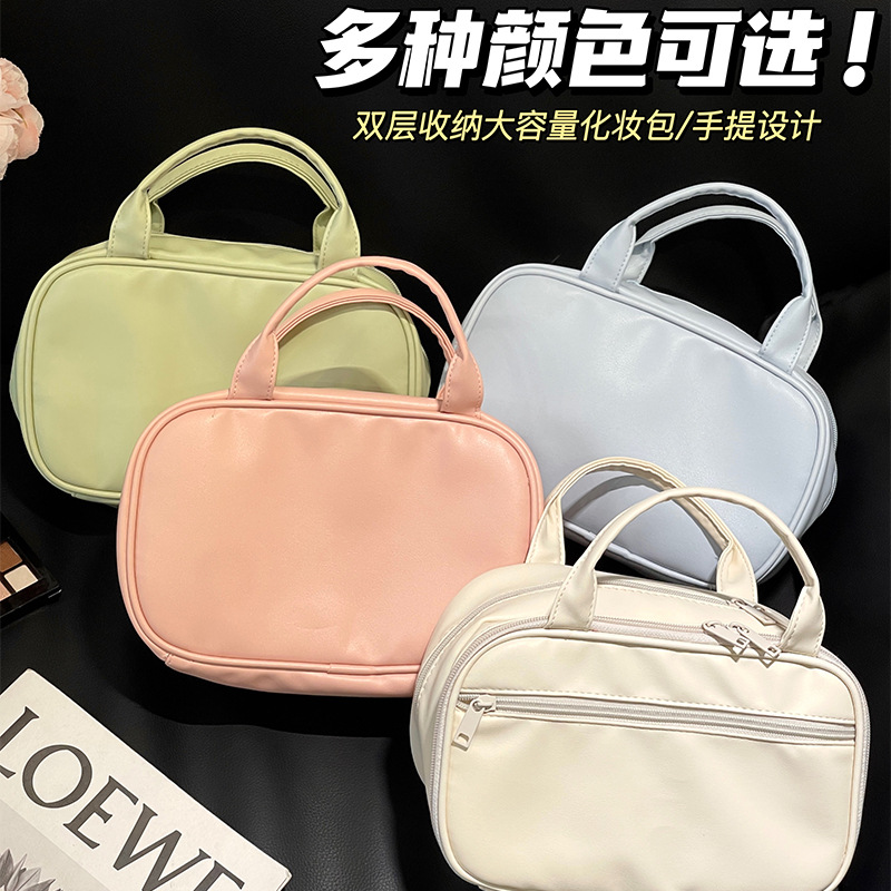 2024 nueva bolsa de maquillaje portátil PU de viaje portátil bolsa de almacenamiento de doble capa de gran capacidad bolsa de alta calidad