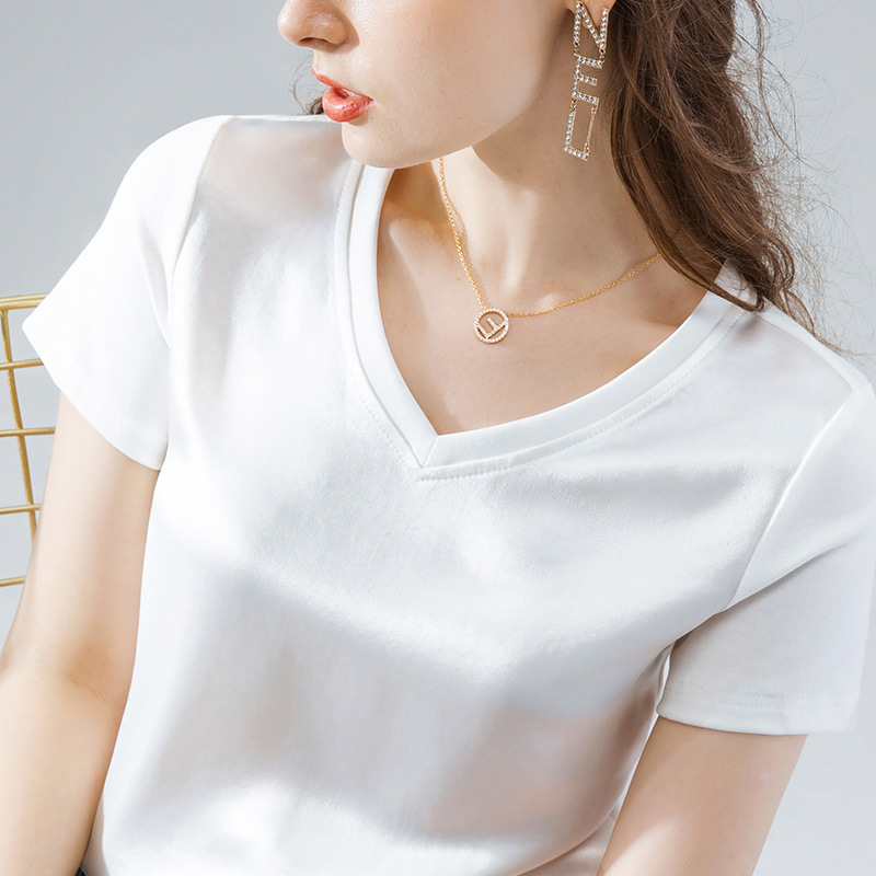 Top de acetato para mujer 2023 verano nuevo estilo coreano de moda de las mujeres sueltas costura satén clavícula cuello en V manga corta Camiseta image 5