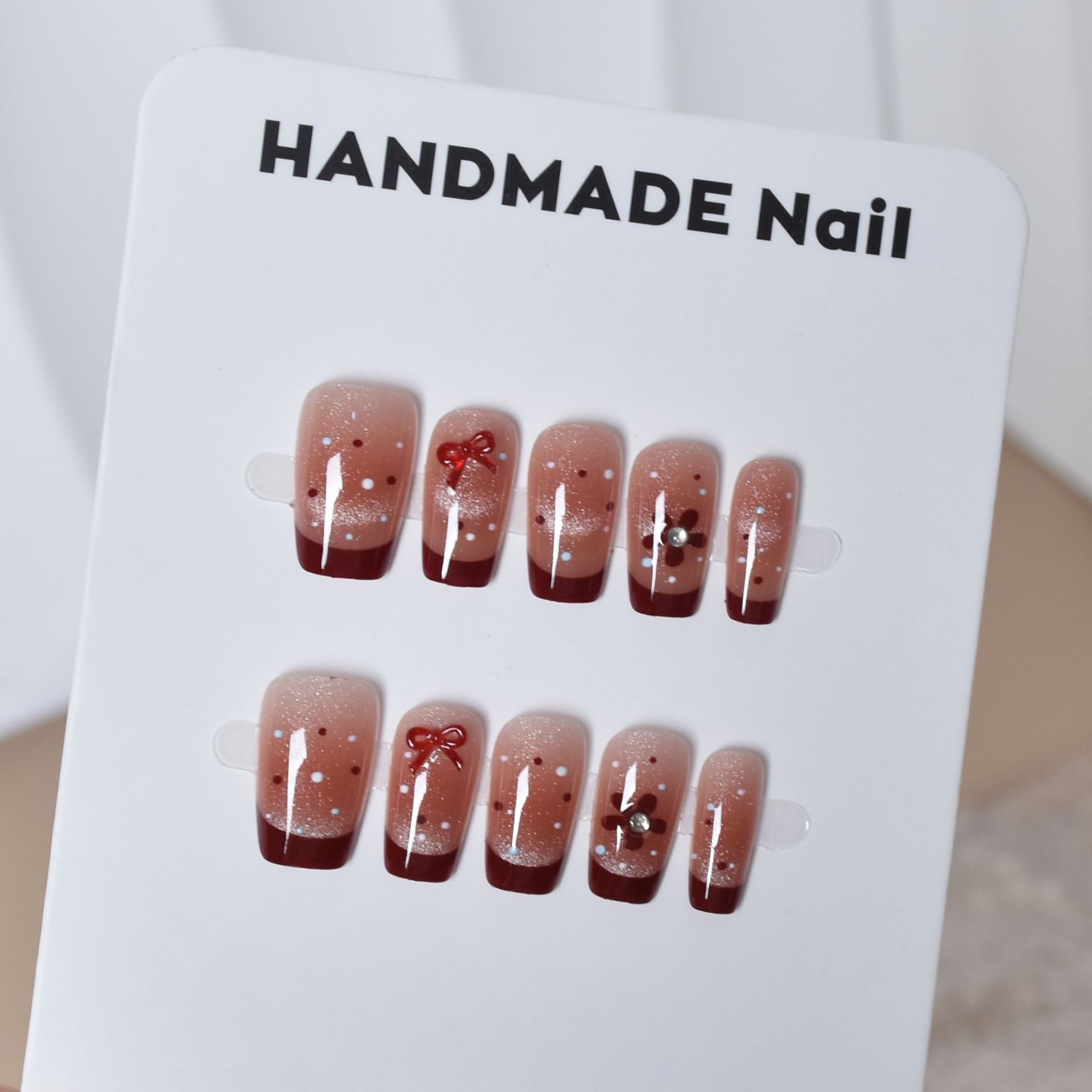 Otoño y invierno blanco rojo francés desgaste de uñas productos terminados al por mayor parches de uñas falsas en el viento desgaste de uñas