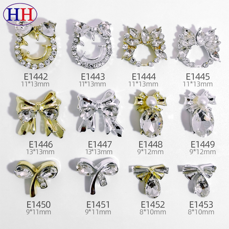 Nuevos accesorios de uñas de aleación especial de comercio electrónico transfronterizo lote mixto sonrisa cara arco uñas pegadas fábrica de diamantes al por mayor