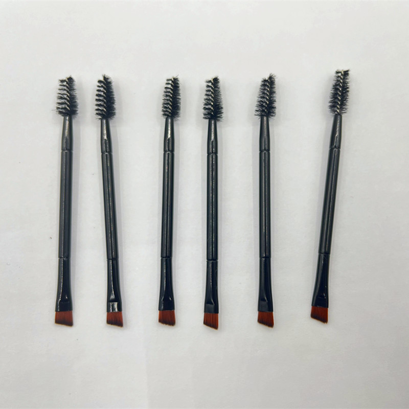 Cepillo de cejas directo de fábrica cepillo de maquillaje transfronterizo negro de doble cabeza oblicua cepillo de cejas lápiz de cejas al por mayor cepillo de pestañas