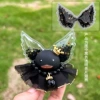 Black transparent sequin wings (gel point)