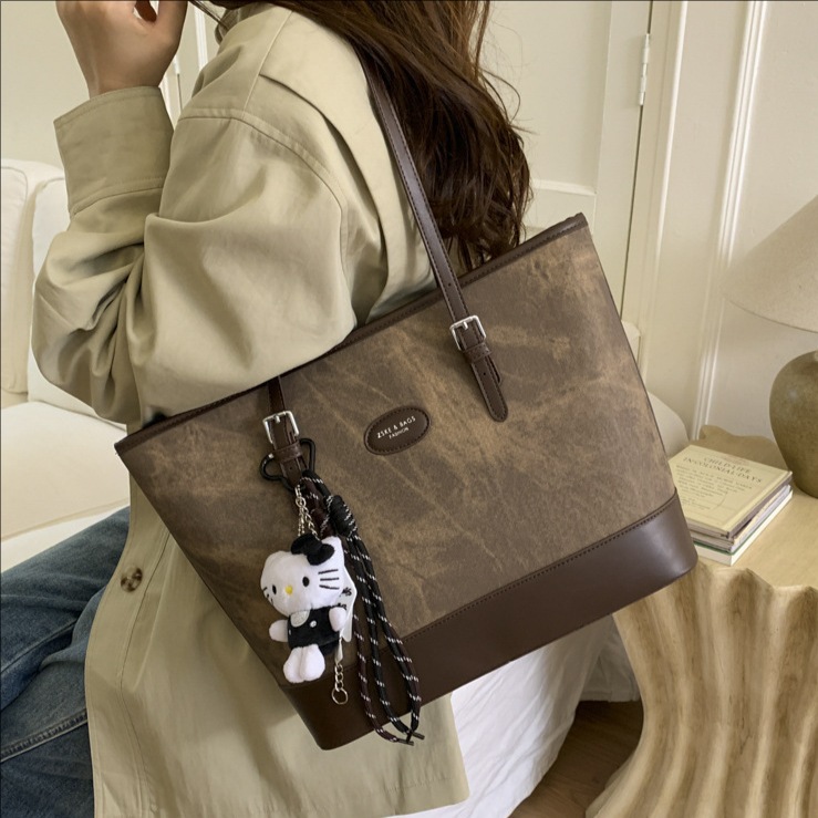 2025 invierno nuevo retro nicho Volkswagen bolso de mano de gran capacidad bolso de hombro de viaje de mujer bolso de brazo de moda versátil bolso de brazo
