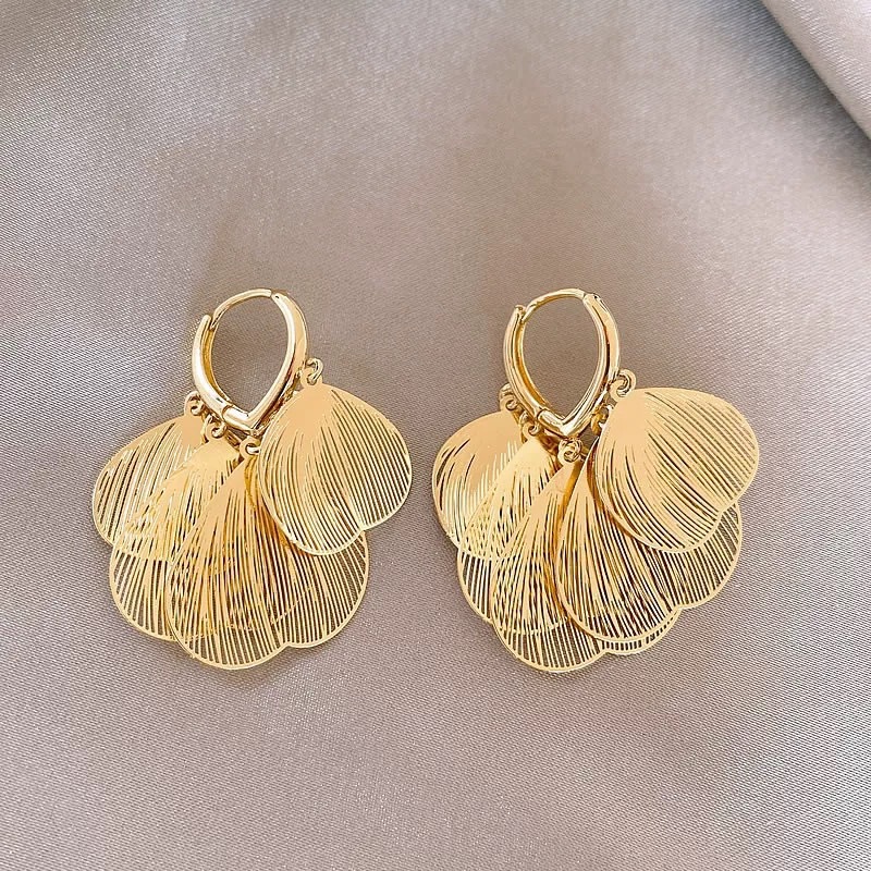 58 # Gold hollow heart petal tassel earrings