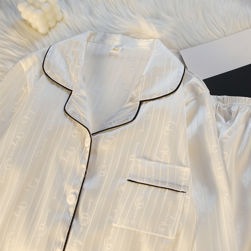 Pareja de pijamas de primavera y otoño de seda de hielo de manga larga de las mujeres a rayas de alto sentido de los nuevos hombres de seda real desgaste del hogar traje de verano