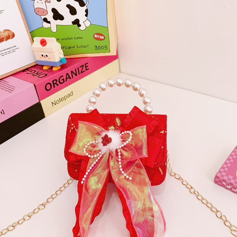 Nuevo arco flotante bolso de niños, bolso de mano de princesa red, bolso de cambio de perlas de moda fragante