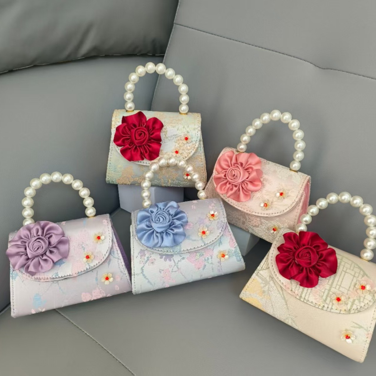 Bolsa portátil de la princesa de perlas estilo nacional arco de hombro bolso de cadena bolso pequeño bolso de cambio de Año Nuevo