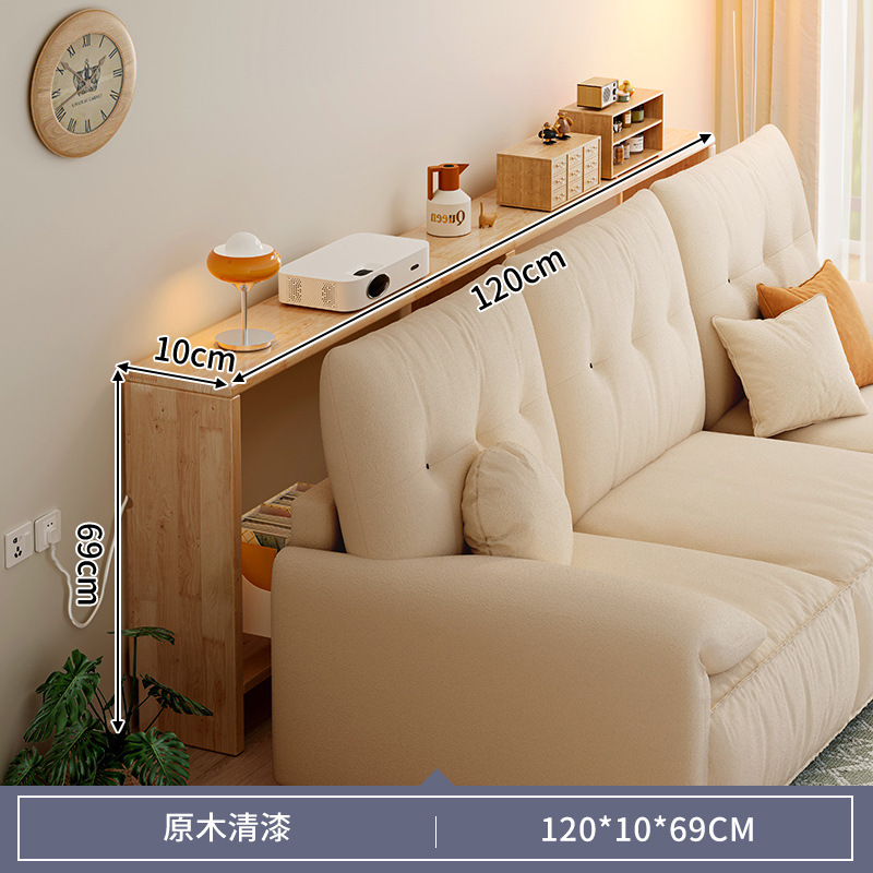 木製のソファーの後ろの棚の長い棚は壁に寄りかかっています。|undefined
