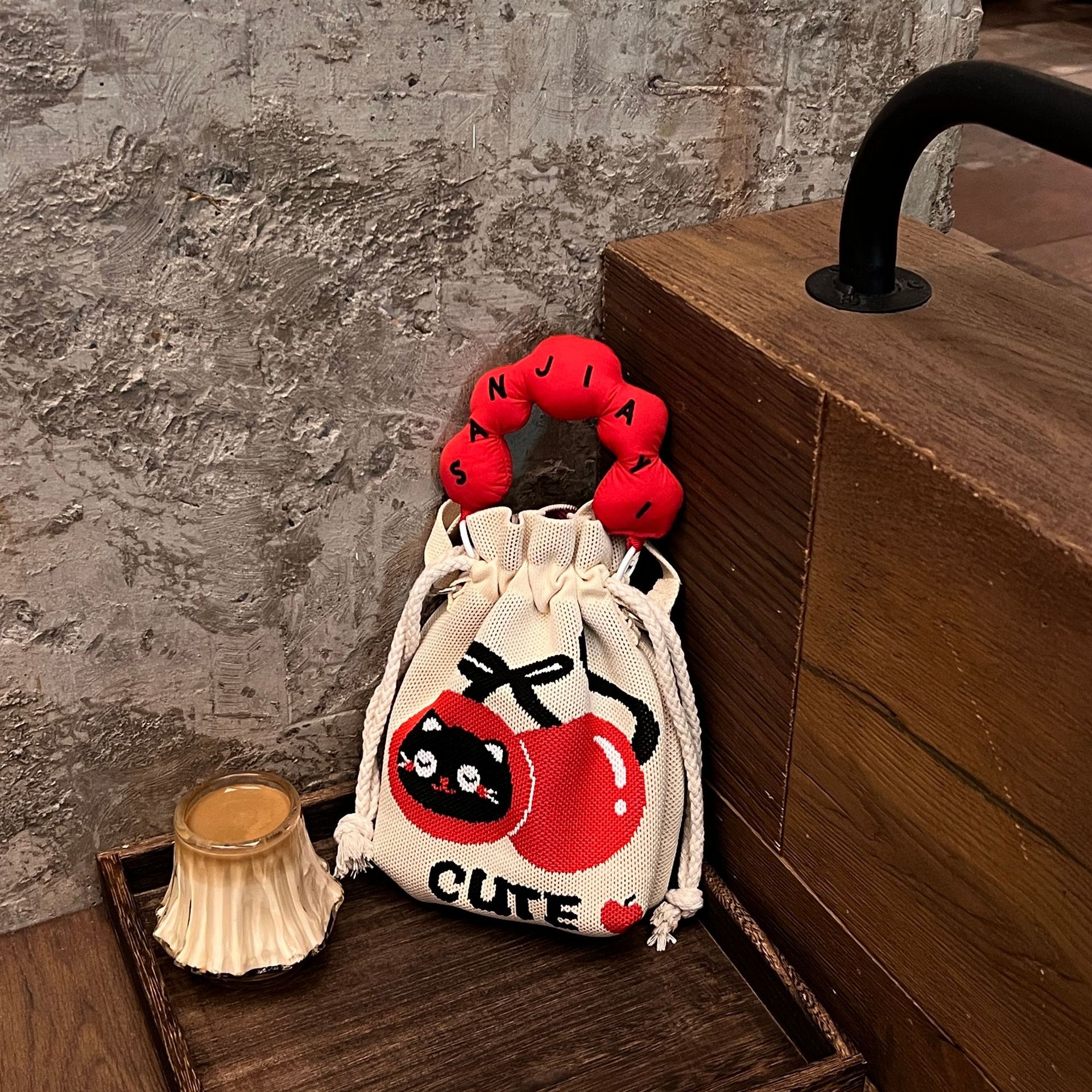 Cherry cat + red handle