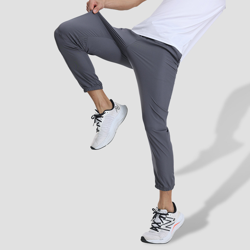 Pantalones deportivos de secado rápido para hombres pantalones casuales de primavera y otoño fitness deportes pista y campo de entrenamiento elástico alto pantalones atados al tobillo